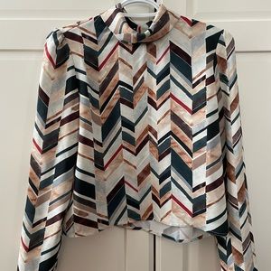 Babaton geometric mock neck blouse